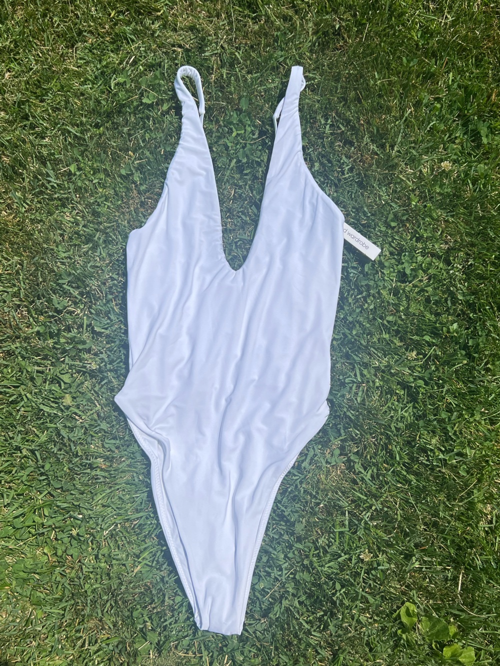 naked wardrobe White Deep-V One-Piece Swimsuit